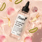 Fleuré Glycolic Acid toner applied with a cotton pad for a smooth, refreshed complexion
